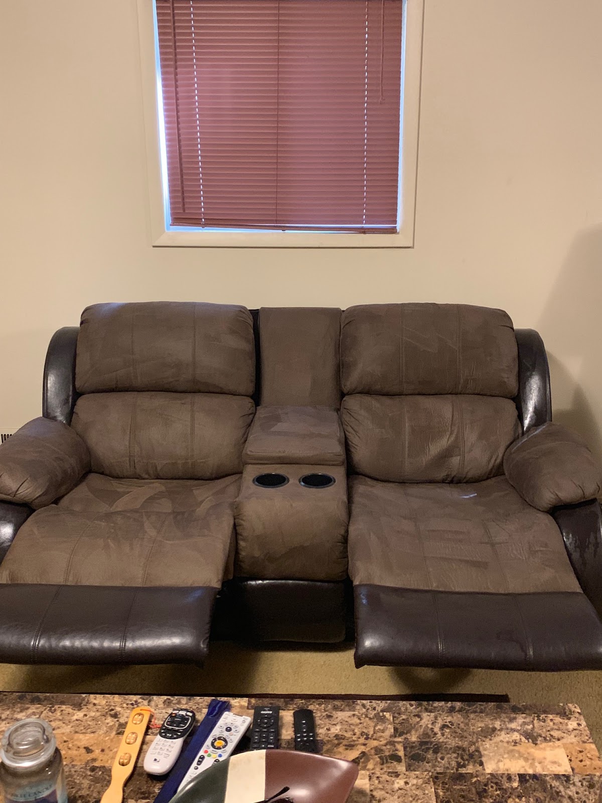 Dream Steam — microfiber and leather recliner loveseat with freshly steamed cushions and arms